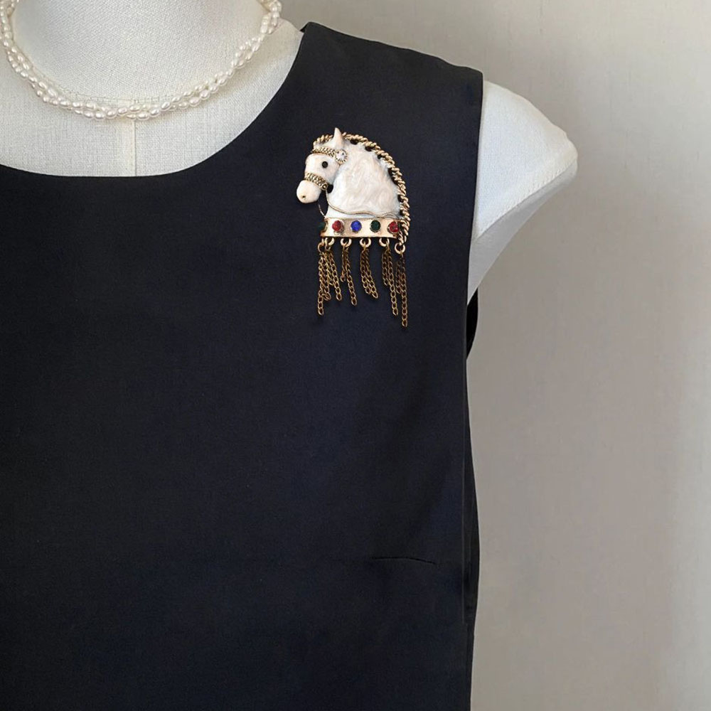 1 broche de moda vintage con c - Vintage Fashion Ads reseña y precio